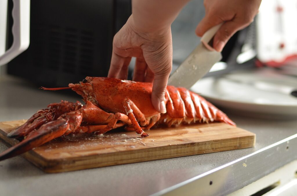 Joy Real - Chef preparing lobster