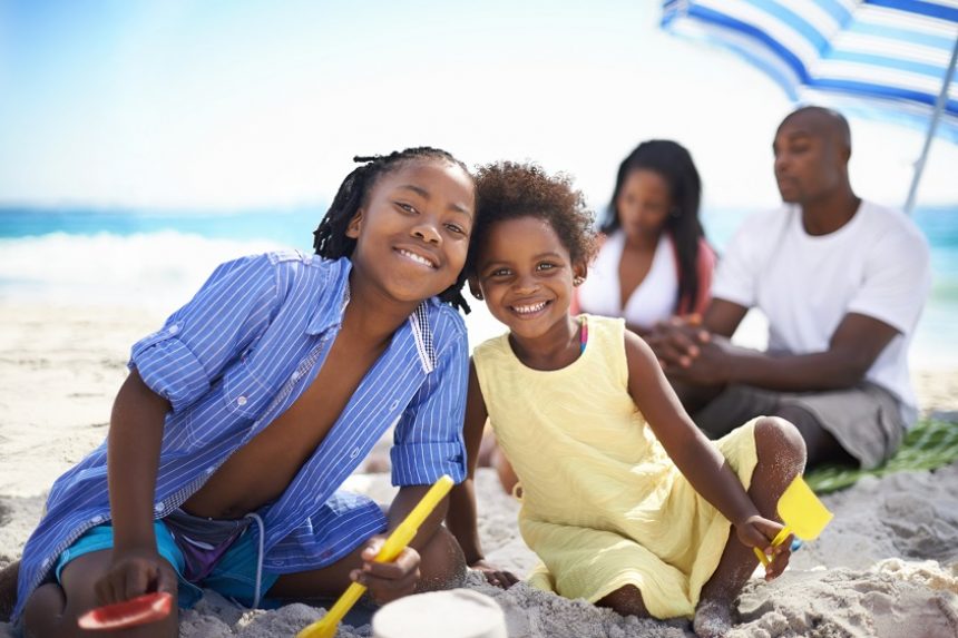 family enjoying time at the beach